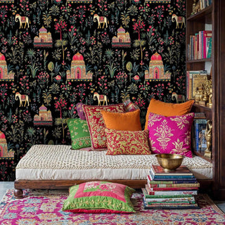 Indian temple wallpaper featuring elephants and florals displayed in elegant library with built-in bookshelves