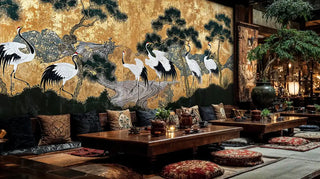 Japanese crane wall mural with white cranes and pine trees on gold, in traditional restaurant with low tables
