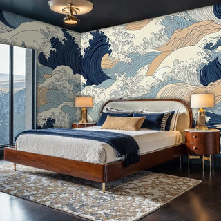Japanese wave wall mural in navy and beige, displayed in luxury bedroom with curved headboard and brass lamps