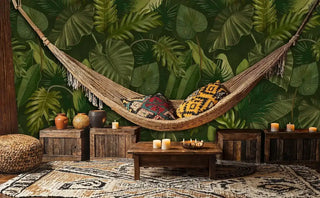 Jungle paradise wallpaper with oversized tropical leaves, creating boho atmosphere with woven hammock