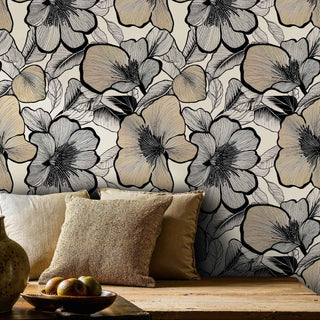 Large-scale hibiscus wallpaper in cream and brown tones, styled with rustic wooden bench and textured pillows