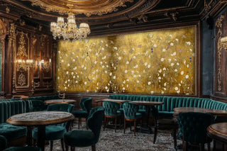 Luxury golden bird and flower wall mural in sophisticated commercial cafe with emerald green velvet seating