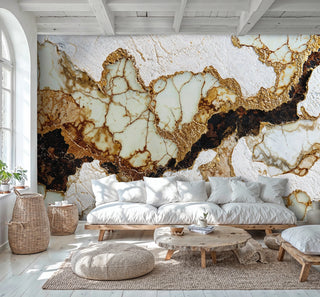 luxury marble wallpaper with gold veins and cream stones, shown in bright living room with white sofa