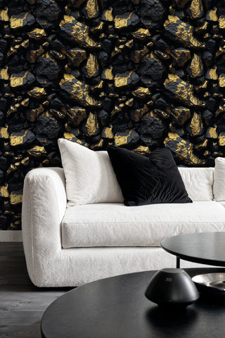 Luxury stone pattern wallpaper featuring black minerals and gold highlights in contemporary living room with cream sofa