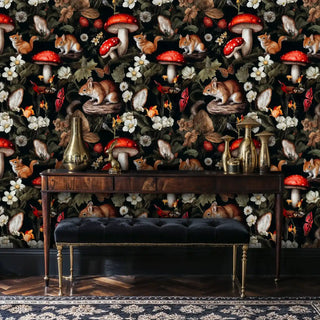 Magical woodland wallpaper with red mushrooms and creatures, displayed in elegant hallway with tufted bench