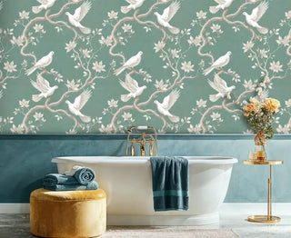 Magnolia and dove wallpaper in soft sage tones, shown in luxurious bathroom with freestanding bathtub