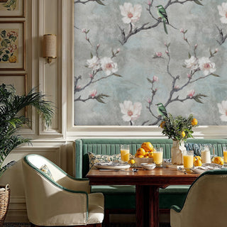 Magnolia botanical wallpaper with birds in dining room featuring green banquette seating