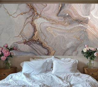 Marble geode wall mural with flowing patterns in cottage bedroom featuring pink floral arrangements
