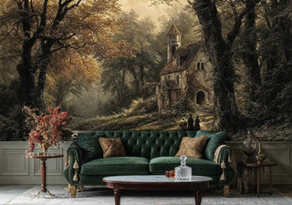 Medieval chapel forest wall mural featuring ancient stone building and golden autumn trees, shown in elegant living room with green velvet sofa