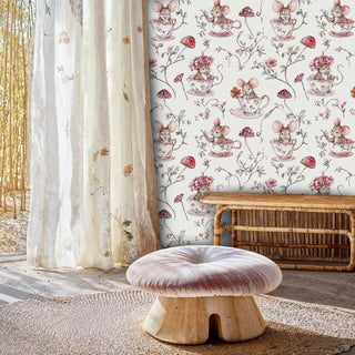 Mice in teacups wallpaper featuring delicate florals in boho nursery with mushroom stool and bamboo bench
