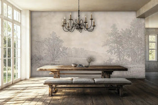 Misty lakeside wall mural with detailed tree silhouettes, bright dining room with rustic wooden table and chandelier