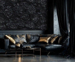 Monochromatic rose wallpaper in sophisticated living room with black leather sofa and gold accents