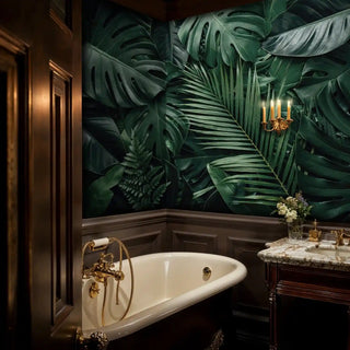 Moody botanical wall mural featuring tropical leaves, displayed in luxurious bathroom with clawfoot tub