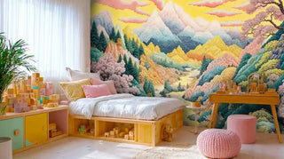 Mountain valley wall mural with pastel peaks and cherry blossoms in a bright kids room with wooden bed and toy blocks