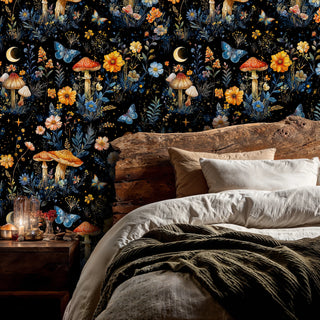 Mystical forest wallpaper with blue butterflies and flowers in cozy bedroom with rustic wooden headboard
