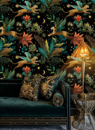 mystical leopard wallpaper featuring tropical foliage and celestial elements, displayed with golden floor lamp