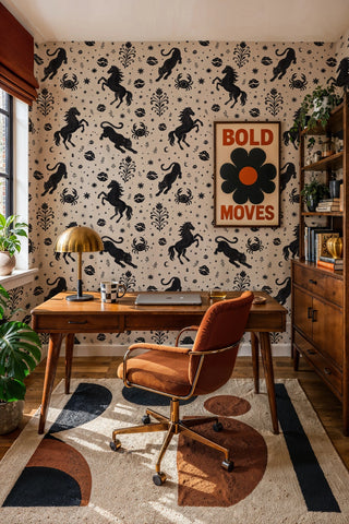 Mystical motif wallpaper featuring panthers and botanicals on beige, in a home office with wooden desk