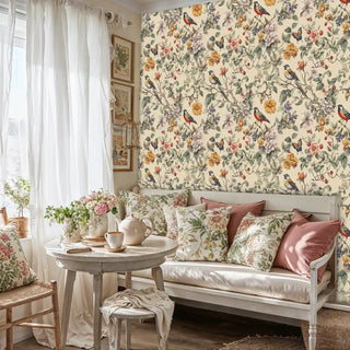 Natural garden wallpaper featuring songbirds and blooms in cozy sitting area with white daybed