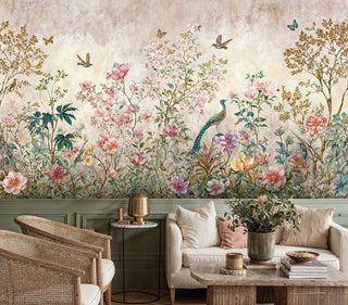 Nature-inspired wall mural showcasing pink blossoms and birds in modern living room with sage green wainscoting