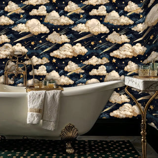 navy celestial wall mural featuring cream clouds and golden stars in luxury bathroom with clawfoot tub