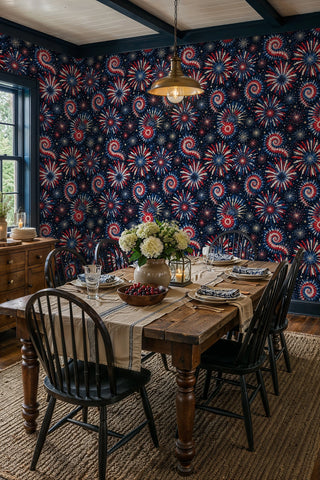 Navy fireworks wallpaper with spiraling starbursts, in a farmhouse dining room with windsor chairs