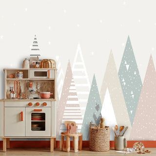 Nordic mountain wallpaper with striped triangular designs, displayed in bright playroom with wooden play kitchen