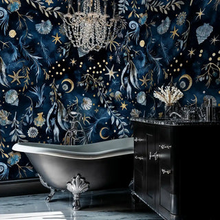 Ocean celestial wallpaper featuring marine life and golden constellations, shown in luxury bathroom with clawfoot tub