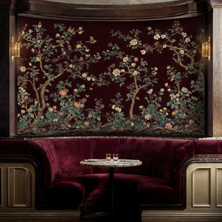 Oriental garden wall mural featuring botanical design in intimate lounge with curved burgundy banquette seating