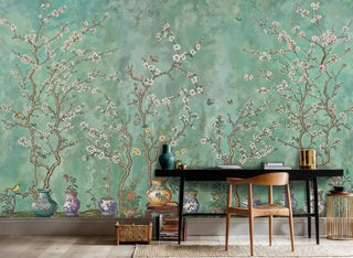 Oriental garden wallpaper featuring flowering trees and ceramic pots, styled in modern home office with wooden desk
