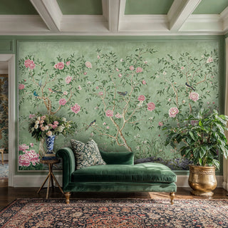 Oriental peony wall mural with delicate birds and branches, showcased in formal living room with green chaise
