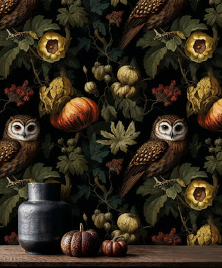 Owl botanical wallpaper in black and green with pumpkins, styled by a black vase