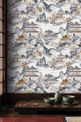 Pagoda landscape wallpaper in watercolor style in a Japanese-inspired room with ceramic tea set and shoji screen