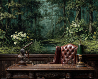 Painterly woodland wall mural with white blossoms above a carved desk with leather chair and brass telescope