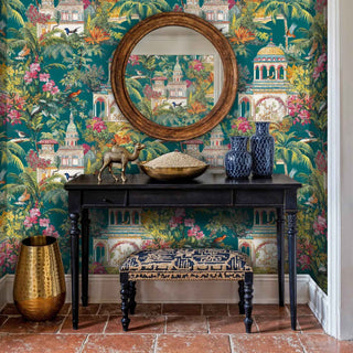 Palace garden wallpaper with detailed temples and palm fronds, displayed in sophisticated entryway with round mirror