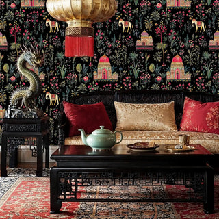 Palace motif wallpaper with ornate architecture and botanicals shown in living room with brass dragon sculpture