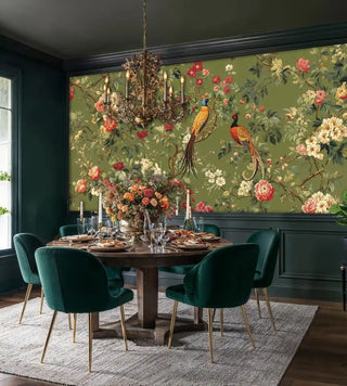 Paradise birds wallpaper with coral peonies and white blooms on olive backdrop in elegant dining room with velvet chairs