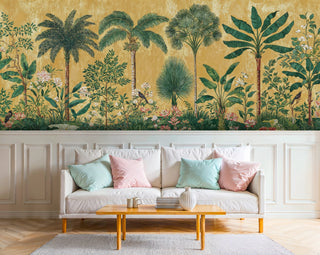 Paradise botanical wallpaper showing diverse palm species and exotic blooms, installed in bright living room with cream sofa and wooden coffee table