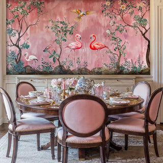 Paradise garden wall mural with tropical birds and botanicals, shown in formal dining room with antique table setting
