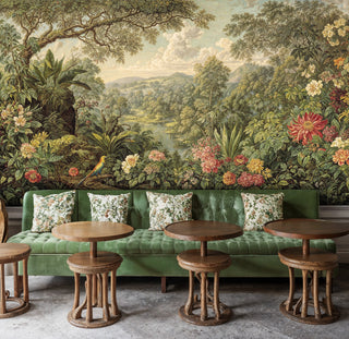 Paradise landscape wall mural featuring colorful blooms in cafe setting with green banquette seating