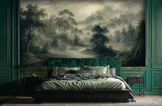 Pastoral landscape wall mural featuring misty hills and ancient trees in earthy tones, displayed in elegant bedroom with velvet headboard