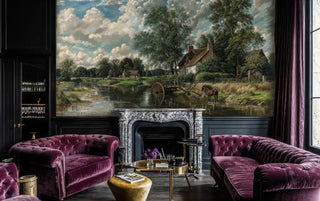 Pastoral landscape wall mural showing water mill and cottages in traditional living room with purple velvet furniture