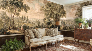 Pastoral landscape wall mural with rolling hills and trees in warm tones, displayed in elegant living room with cream sofa