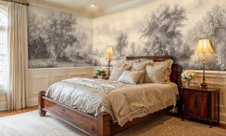Pastoral landscape wallpaper in sepia tones featuring detailed trees, displayed in traditional bedroom with wooden furniture