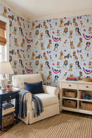 Patriotic dogs wallpaper featuring costumed pups and flags in a cozy living room with cream armchair and navy accents.