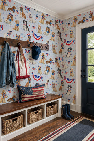 Patriotic dogs wallpaper with star-spangled pups and flags in a farmhouse entryway with coat hooks and rain boots.