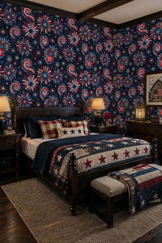 Patriotic fireworks wallpaper with swirling red and blue bursts, in a rustic bedroom with star quilt