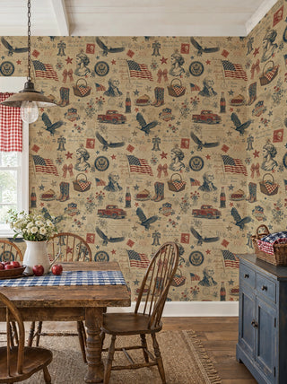 Patriotic heritage wallpaper with flags and vintage icons on tan, in a farmhouse dining room with windsor chairs