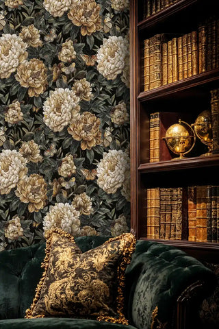 Peony butterfly wallpaper in gold and black, featured in sophisticated library setting with antique globe and leather books
