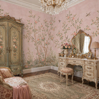 Pink floral bird wall mural in chinoiserie style, displayed in a romantic bedroom with painted armoire and vanity
