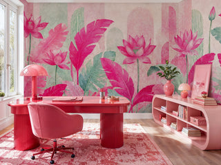 Pink lotus and banana leaf wall mural in vivid magenta and green, styled in a modern home office with red desk